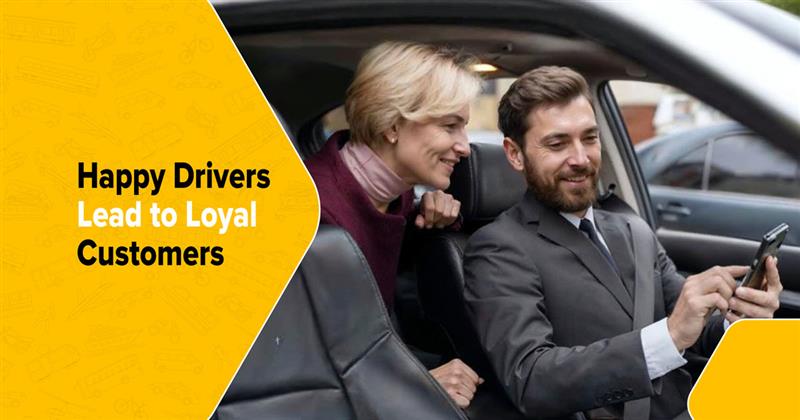  Taxi driver showing a mobile app to a passenger inside a car, highlighting positive driver–passenger interaction and reliable taxi service experience. 